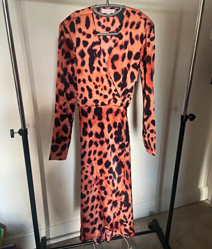 Dancing leopard orange - leopard,